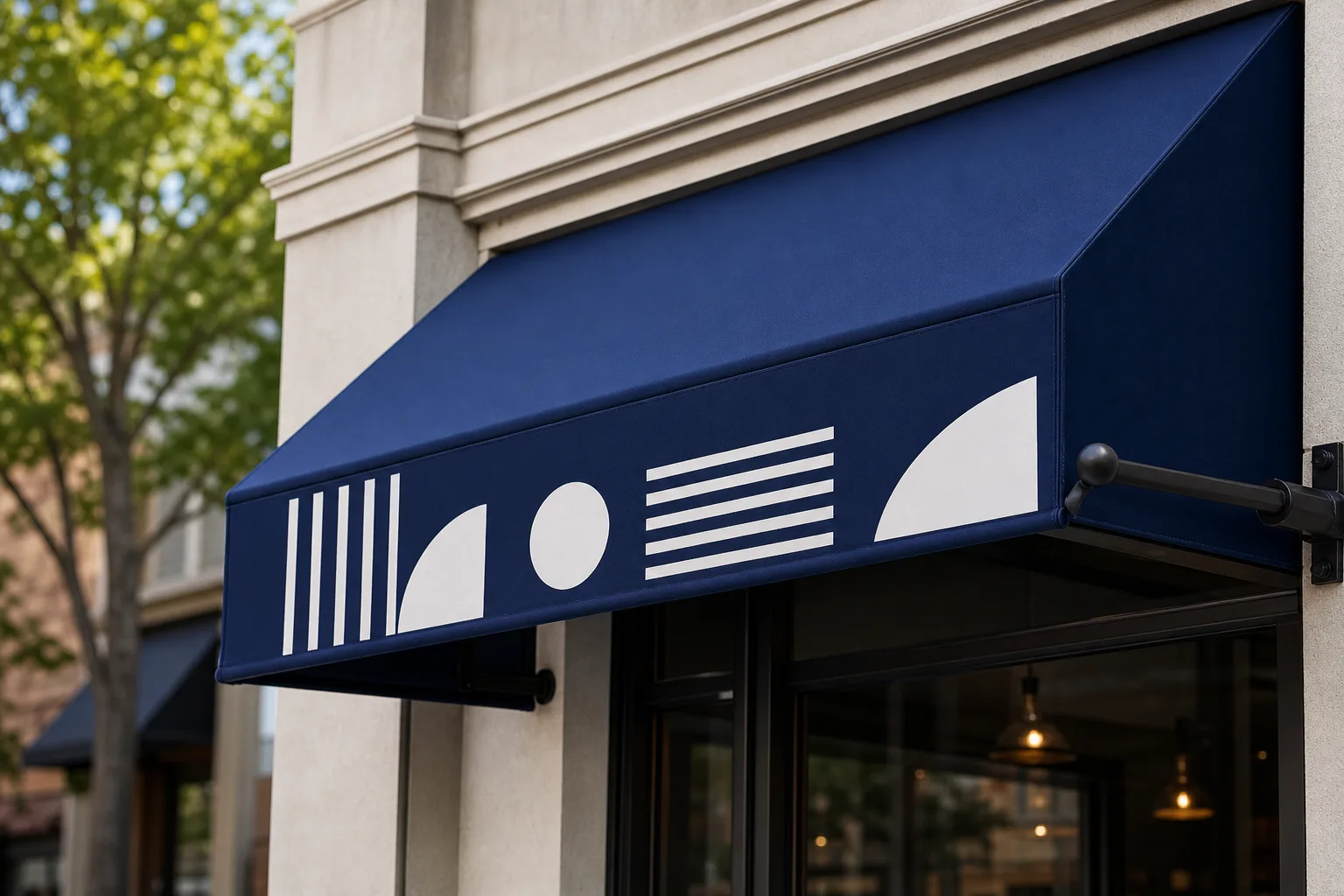 Fabric business awning over a storefront entrance.